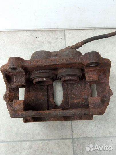 Суппорт тормозной передний правый Renault Espace 3