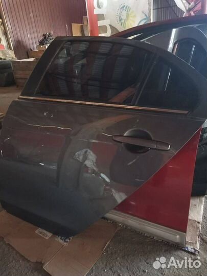 Дверь задняя левая Mitsubishi Lancer 10 рест