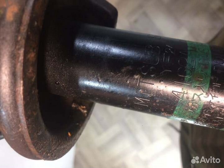 Амортизатор стойка задний Mitsubishi Lancer 10