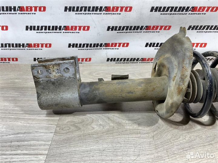 Амортизатор передний левый Пежо 308