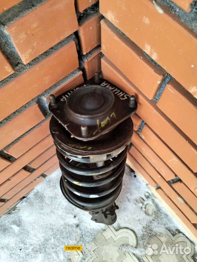 Стойка передняя левая кія спектра