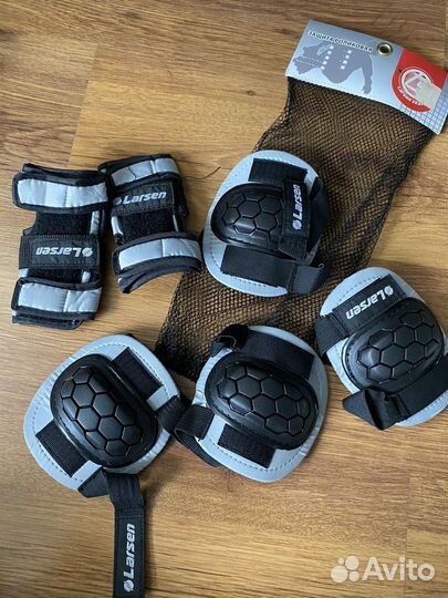 Коньки роликовые защита