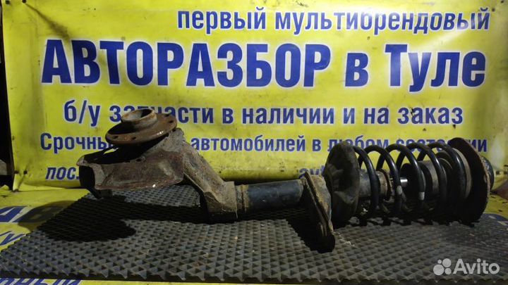 Стойка амортизатора переднего левого Chevrolet Lan