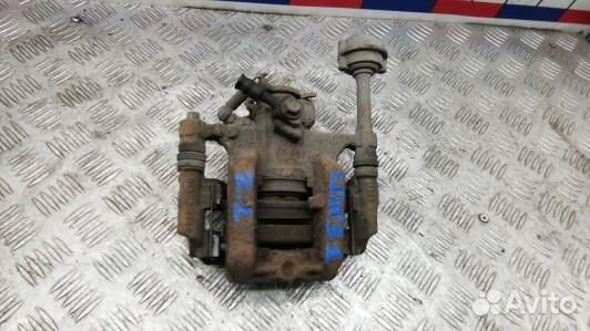 Суппорт тормозной задний левый opel astra J (LDN31