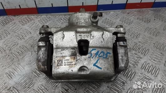 Суппорт тормозной передний левый KIA CEE'D 2 (JD)