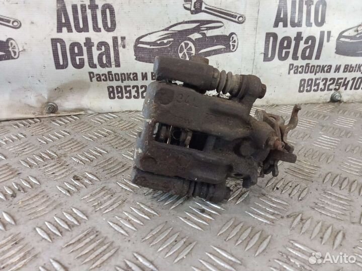 Суппорт задний левый nissan almera n16