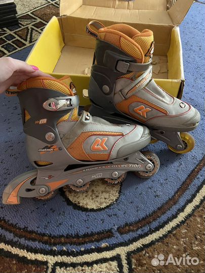 Роликовые коньки