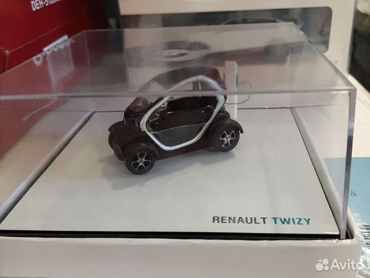 Модель автомобиля Renault Twizy 1:43 7711575499