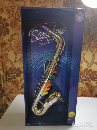 Детская игрушка Музыкальный инструмент Саксофон
