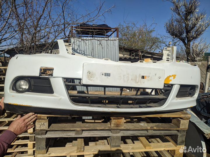 Передний Бампер Nissan almera classic дверная карт