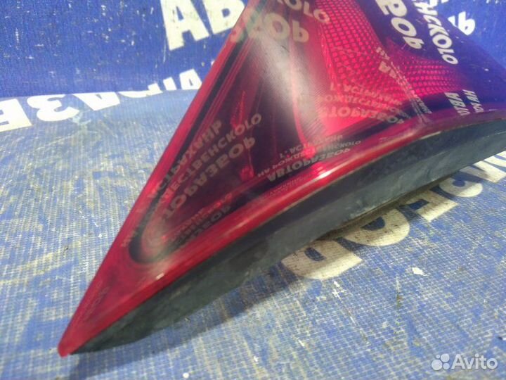 Фонарь крышки багажника левый Opel Astra J хэтчбек