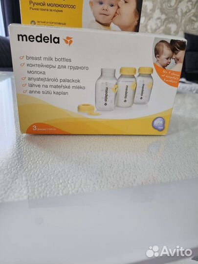 Молокоотсос medela ручной,баночки для сбора молока