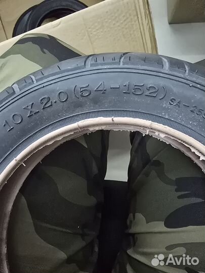 Покрышка новая 10-2 для коляски серая