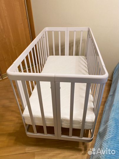 Детская кроватка с продольным маятником