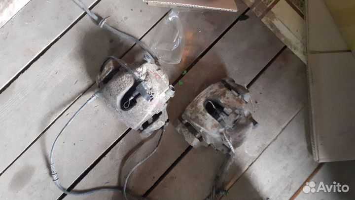 Мерседес 210 суппорт передний