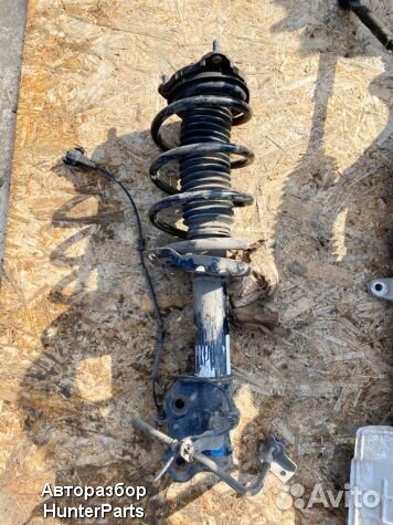 Стойка амортизатора передняя Hyundai Tucson 3