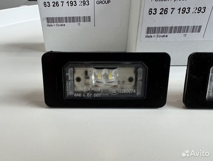 Фонарь подсветки номера BMW