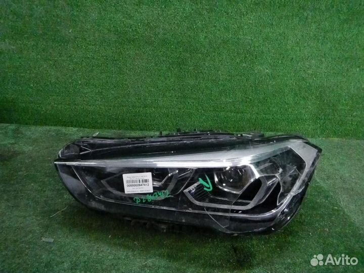 Фара левая BMW X1