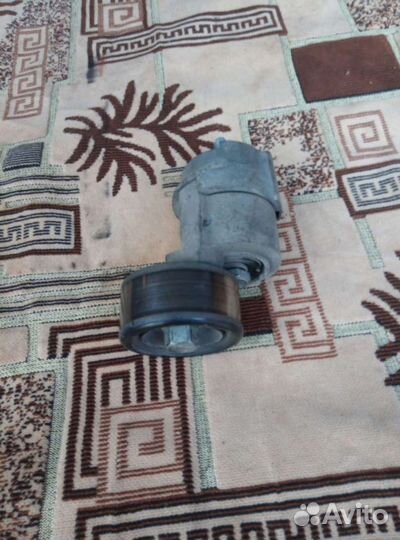 Ролик натяжной на кио спортейдж оригинальный