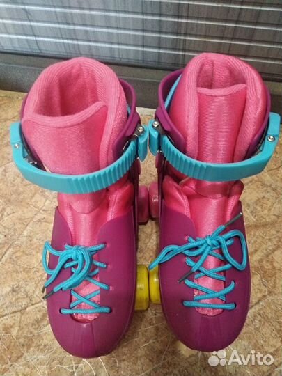 Роликовые коньки