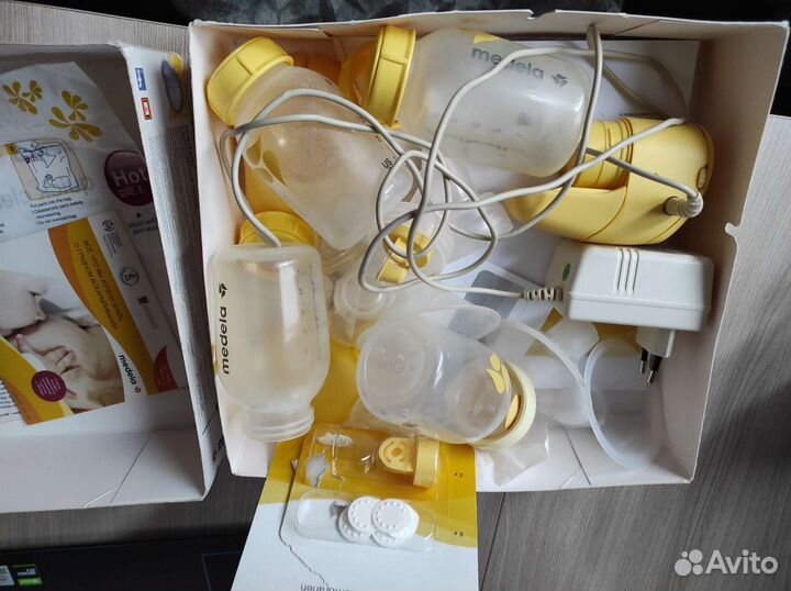 Молокоотсос medela электрический