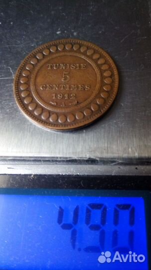 Монета французский тунис(арабская вязь) 1912 г.мед