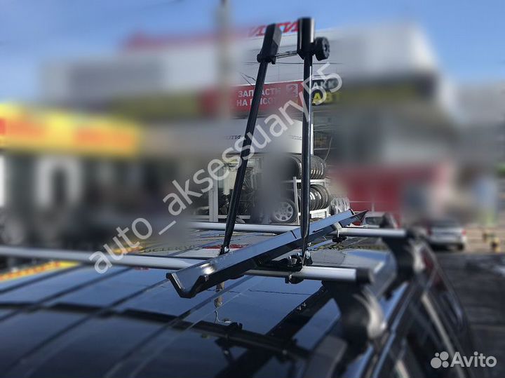 Велокрепление на крышу автомобиля