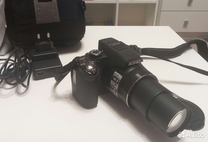 Зеркальный фотоаппарат Nikon coolpix P100