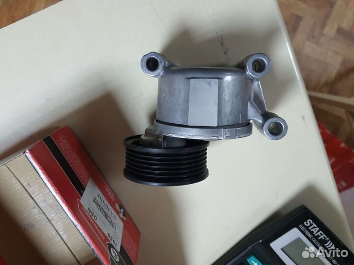 Натяжитель ремня природного ford volvo