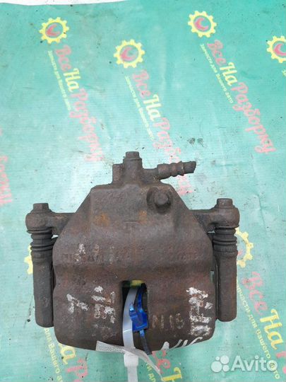 Суппорт передний левый Nissan Almera N16 хечбэк