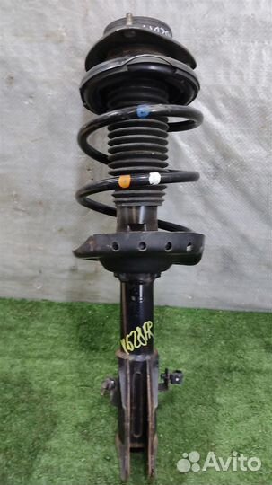 Стойка амортизатора передняя правая Subaru Forest