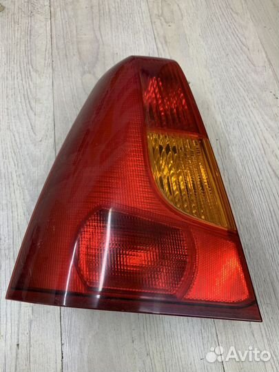 Фонарь задний renault logan Лев