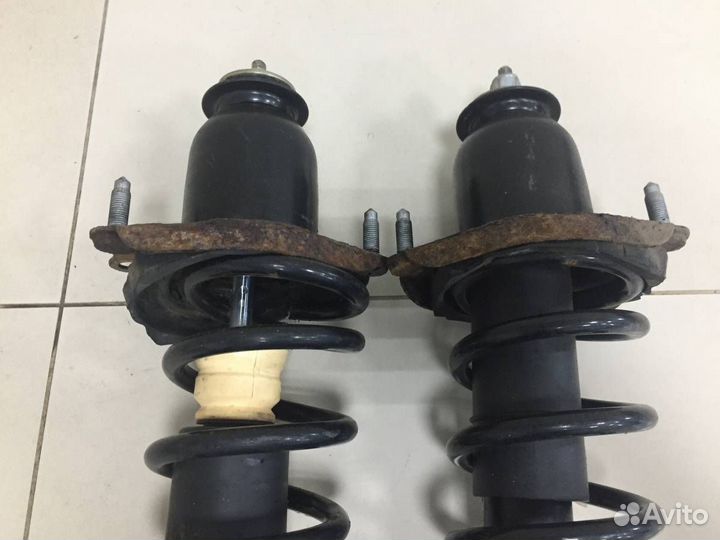 Амортизатор задний Toyota Corolla E120 2001-2007