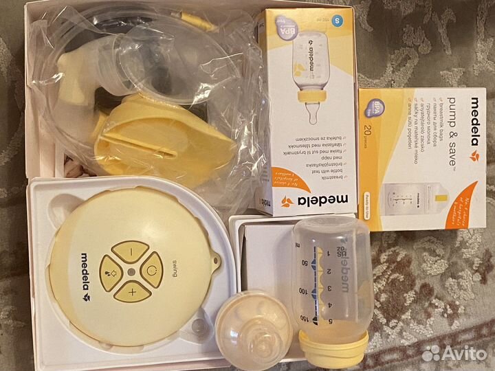 Молокоотсос medela swing электрический