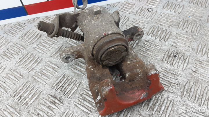 Суппорт задний левый Opel Astra H/Family рест