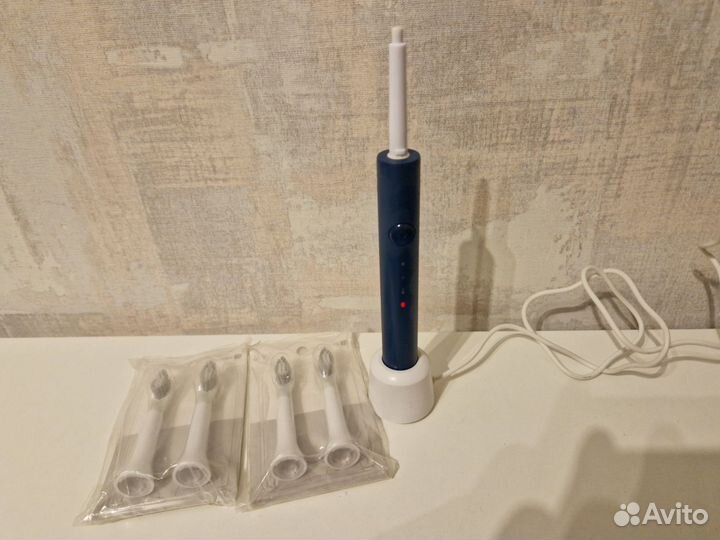 Электронная зубная щетка