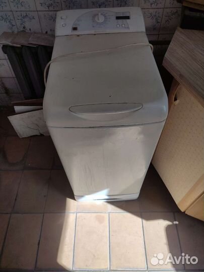 Вертикальная стиральная машина Ariston ATD 104