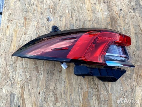 Фонарь левый в крыло Toyota Corolla e210