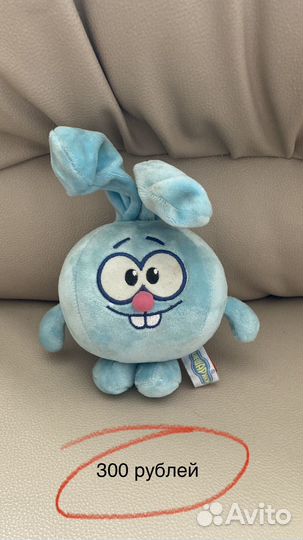 Игрушки мягкие зайцы и кролики