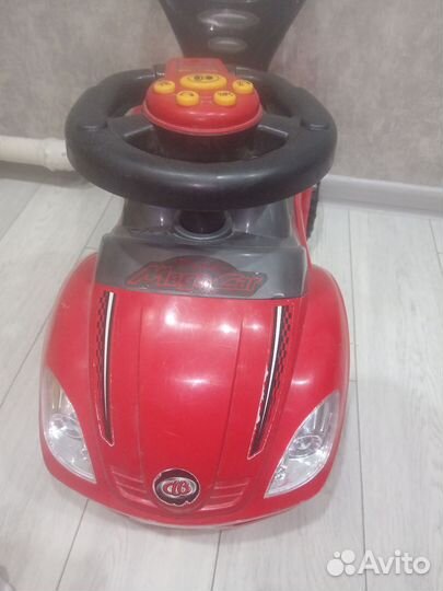 Машинка каталка толокар