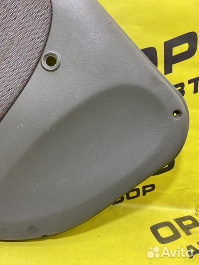 Обшивка двери задняя левая Kia Rio седан A5D 2001