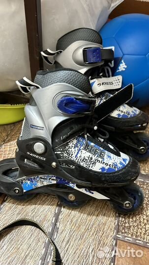 Роликовые коньки