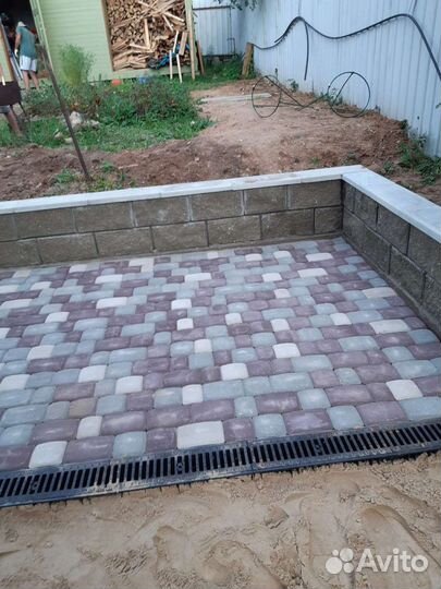 Укладка тротуарной плитки брусчатки