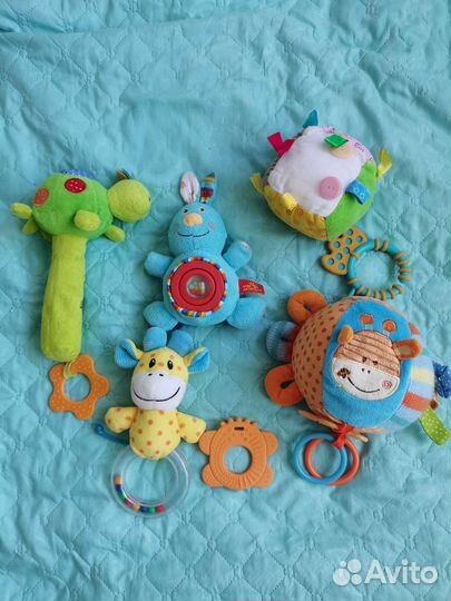 Погремушки, развивающие игрушки