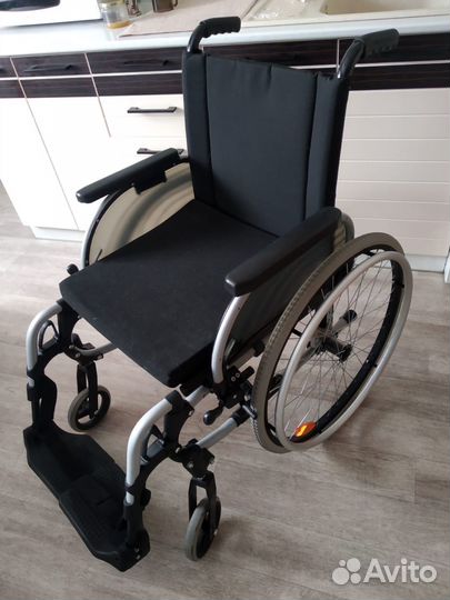 Инвалидная коляска