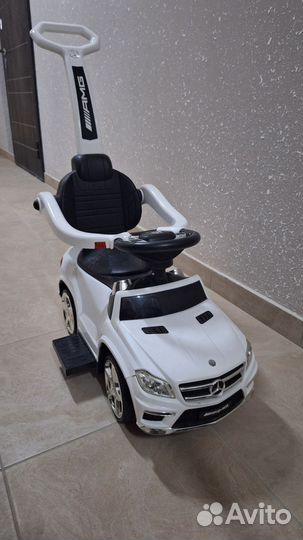 Детская машинка каталка с ручкой