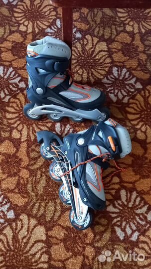 Роликовые коньки