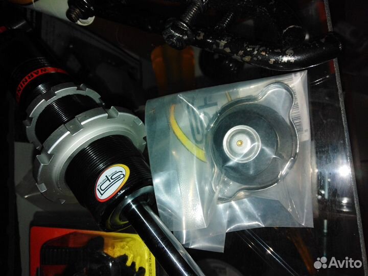 Крышка расширительного бачка снегохода