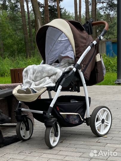 Прогулочная коляска с реверсивным блоком