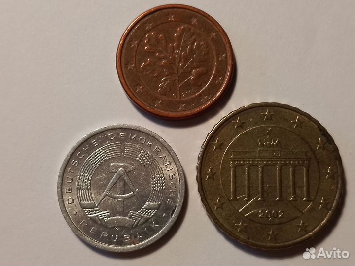 Монеты 1 phenning и Центы США